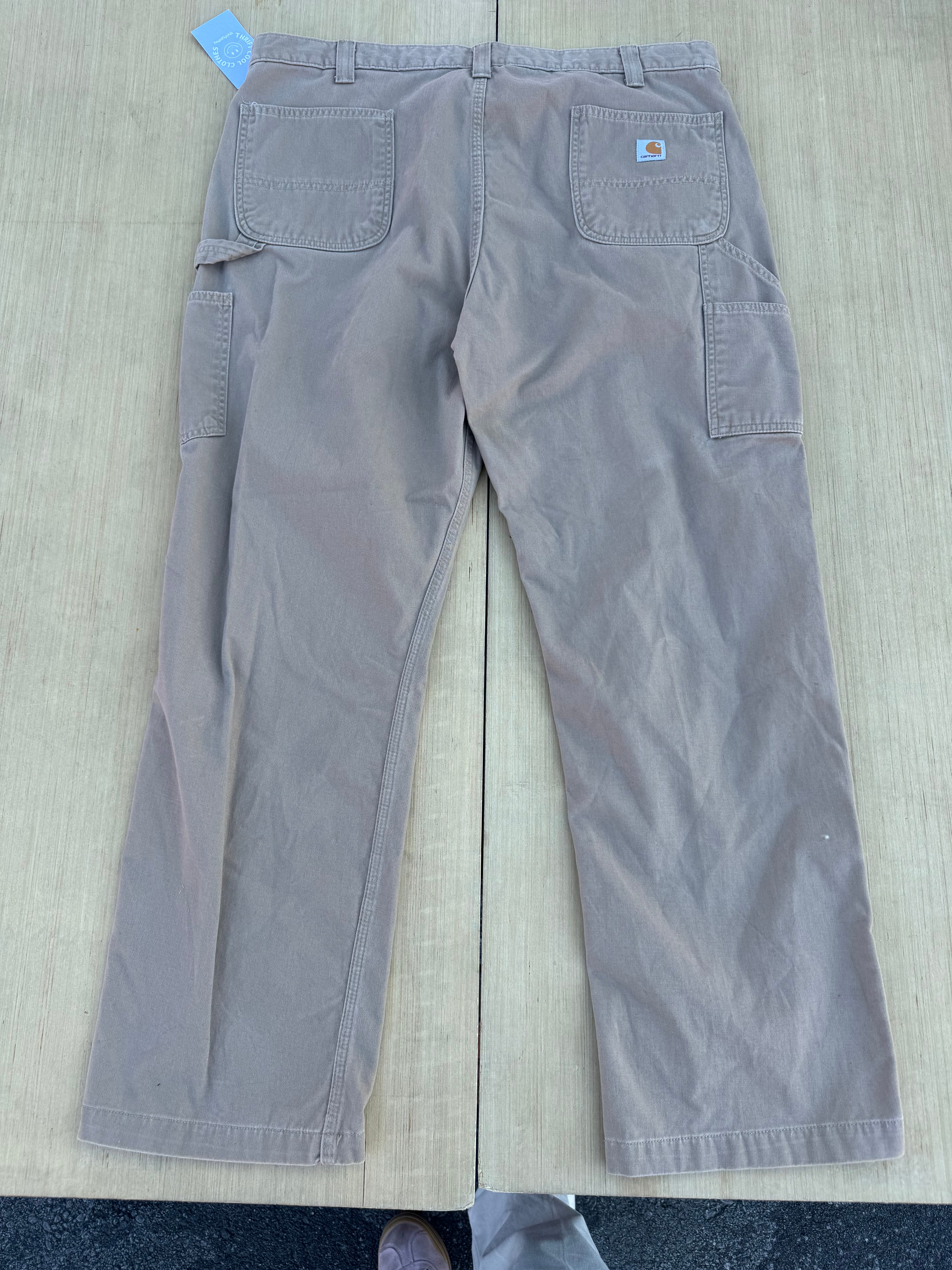 tan Carhartt cargo pants, 42 x 32 (fits like women's size 18-20)